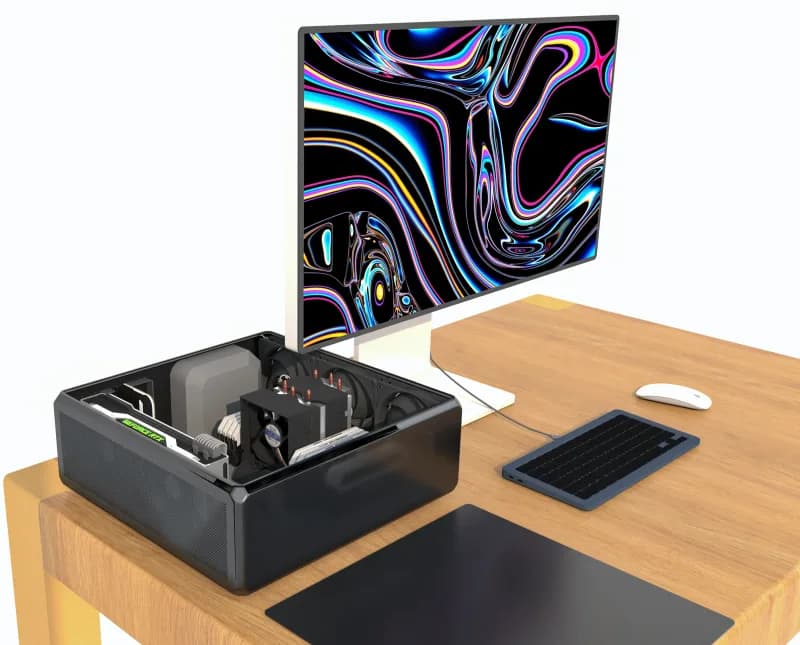 Open computer workstation showing a graphics card, memory slots and an air-cooled processor heat sink