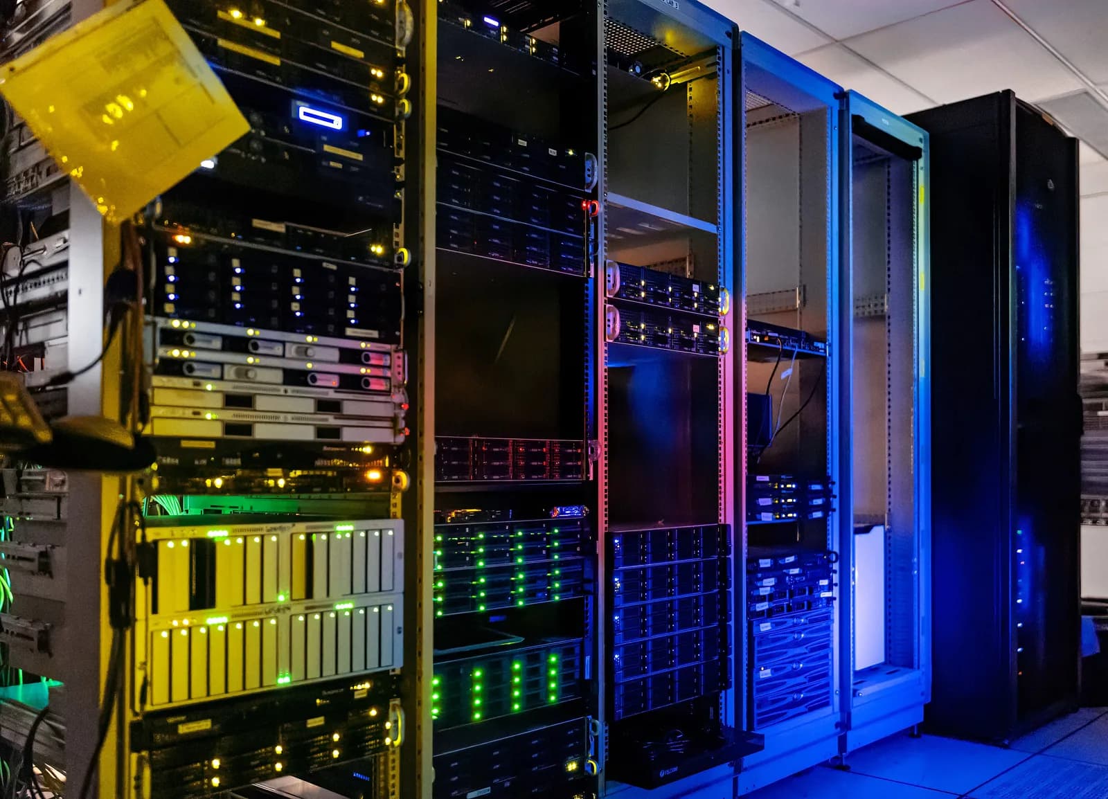Row of server racks with network cabling in the NOIRLab headquarters server room