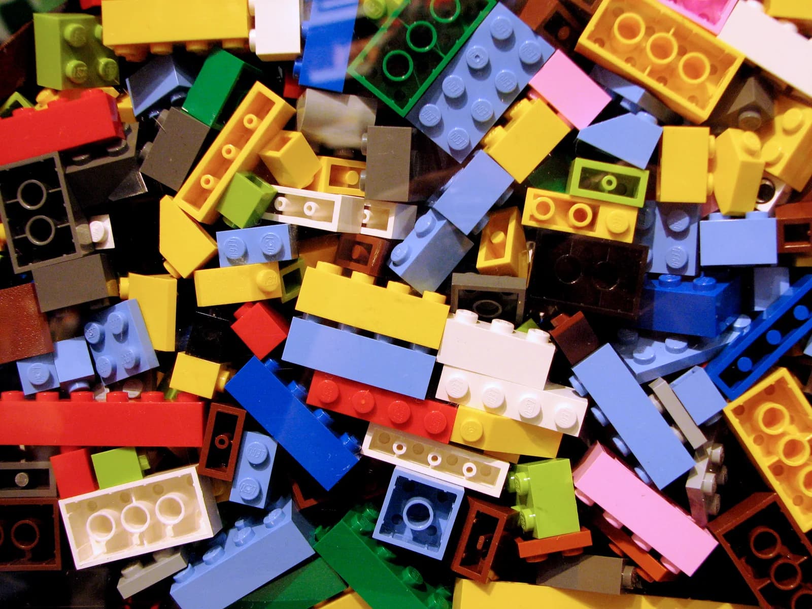 Assorted Lego bricks in many colours and sizes piled together