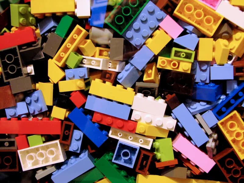 Assorted Lego bricks in many colours and sizes piled together