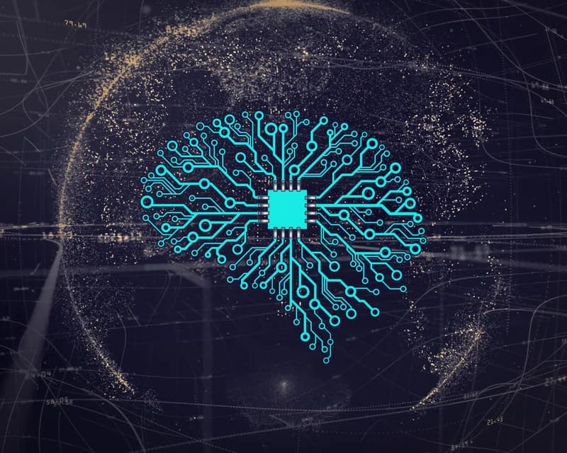 Illustration of a glowing circuit-board brain with a chip at its centre on a dark background