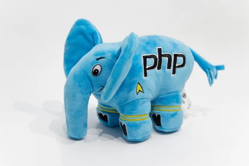 Blue elePHPant plush toy with the PHP logo, the PHP community mascot, illustrating the PHP security release.