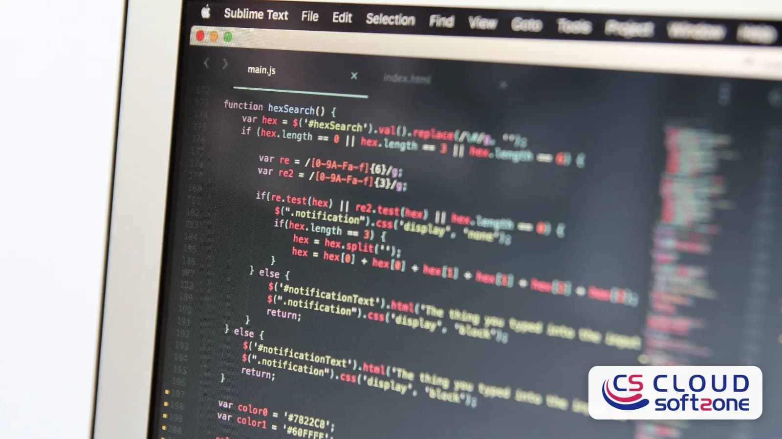 A laptop screen showing JavaScript code in a text editor, with the Cloudsoft Zone logo in the corner